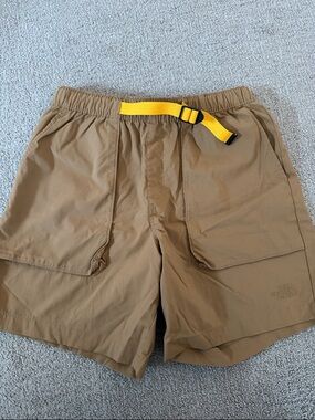 The North Face Tan Shorts with Yellow Webbing Belt
